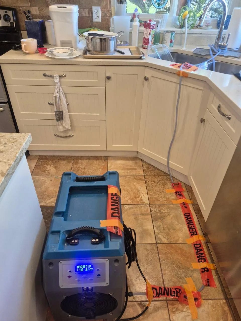 Basement water damage cleanup in Vancouver with drying equipment